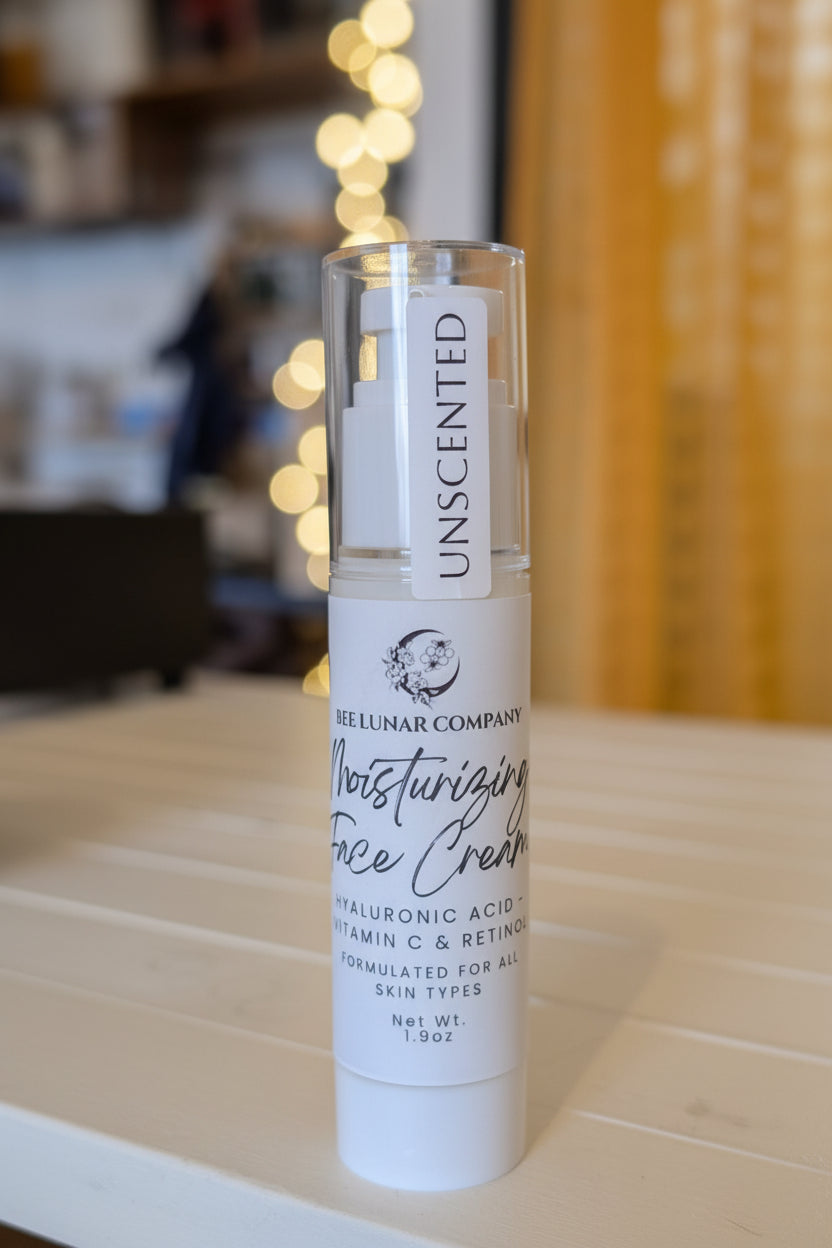 Bottle of Unscented Moisturizing Face Cream on a wooden surface